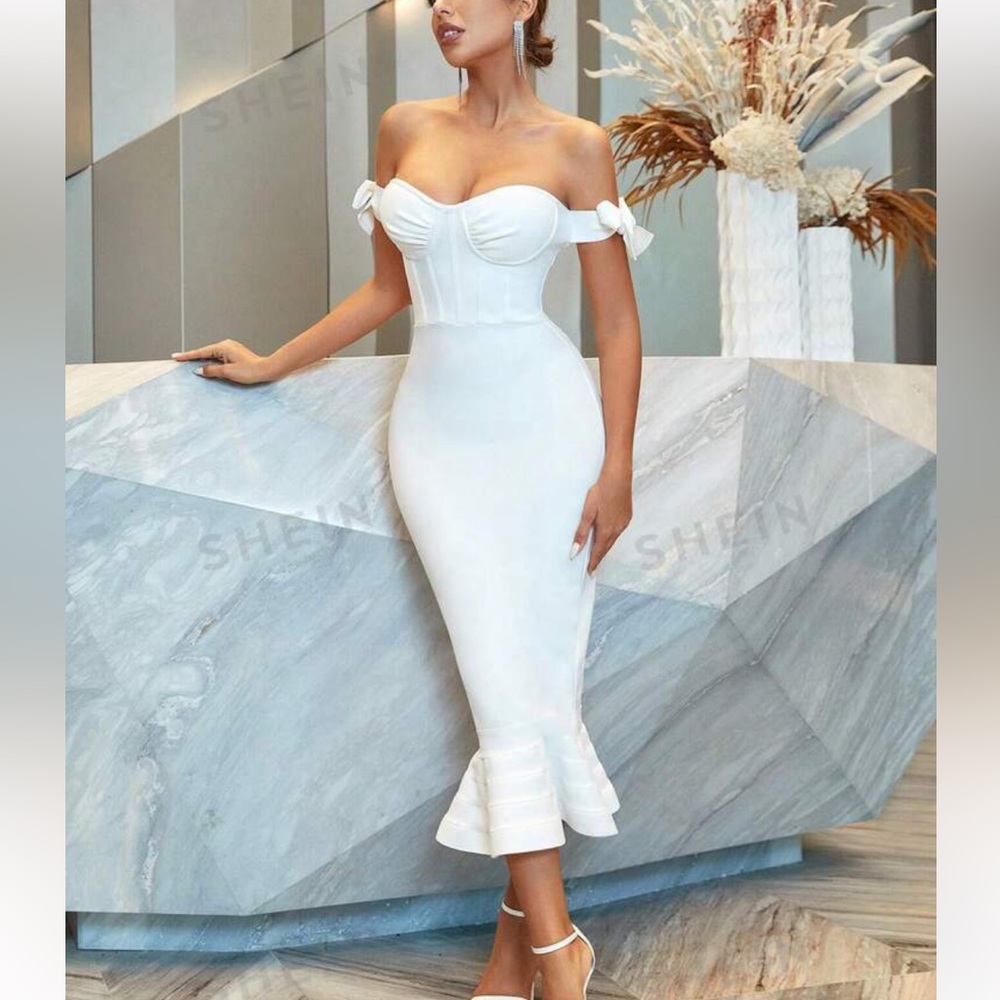White dress. Brand new. Size L